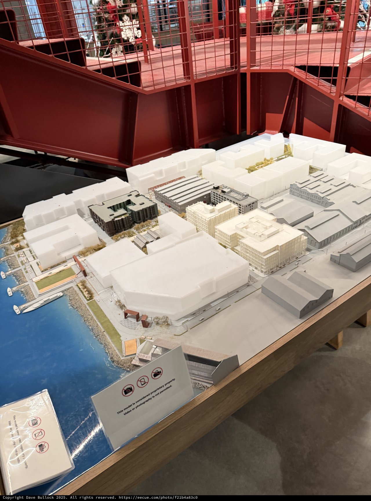 Architectural Model Display in Red Gallery Space