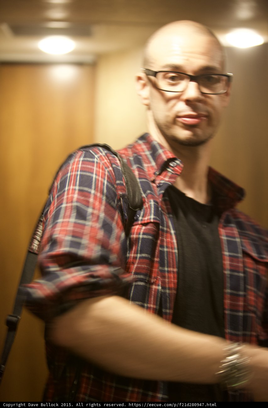 Dave B rocking a plaid shirt and glasses