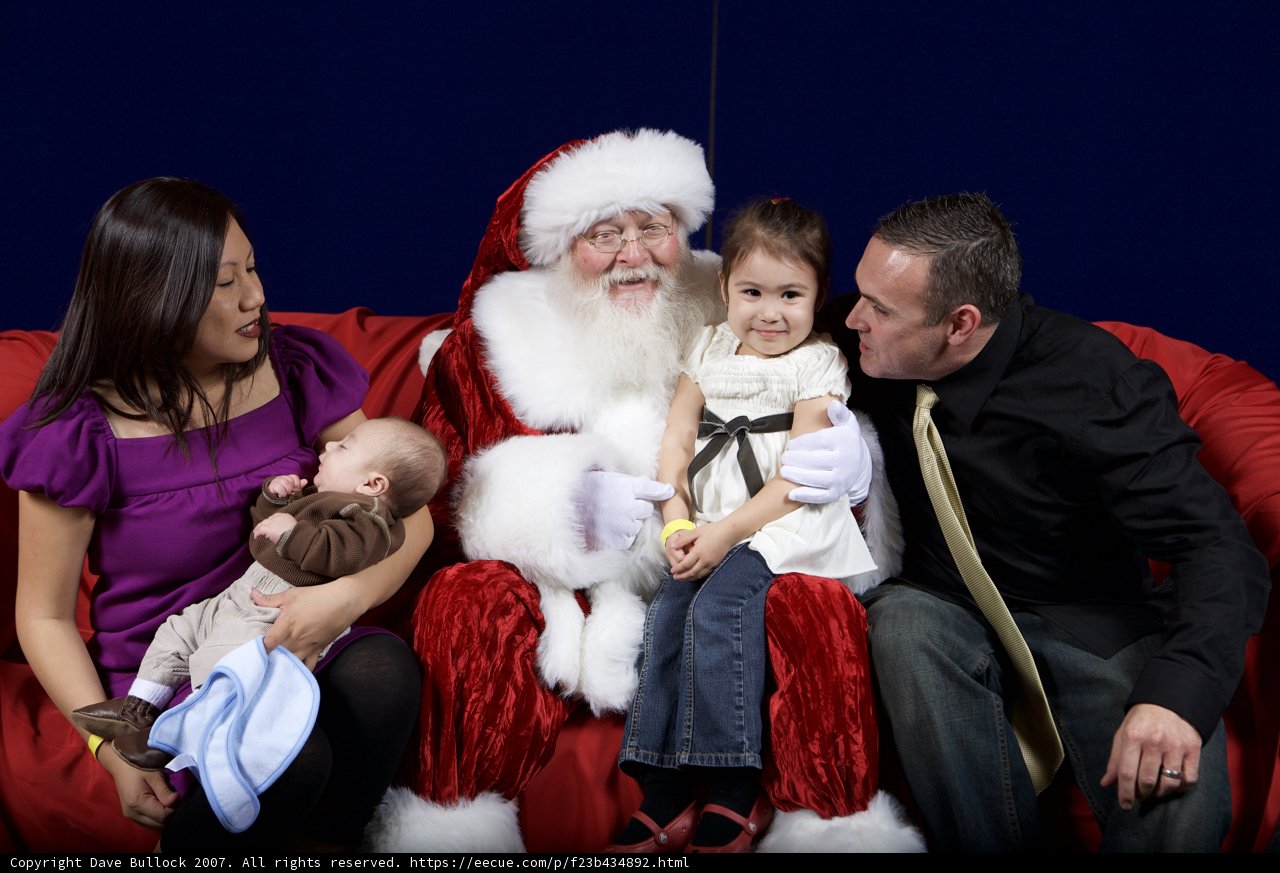 Festive Family Photo with Santa Claus