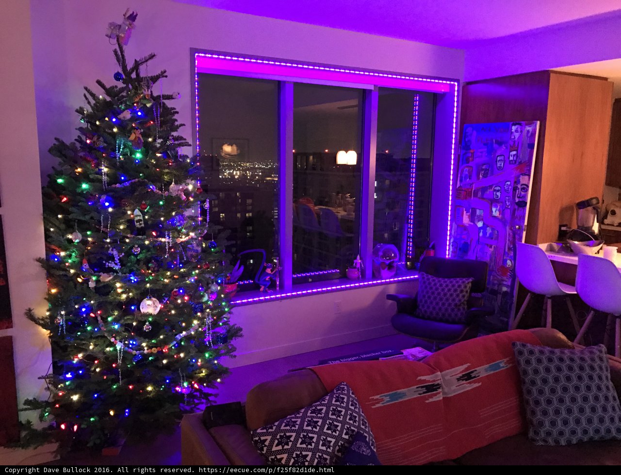 Festive Living Room with Purple-Lit Christmas Tree