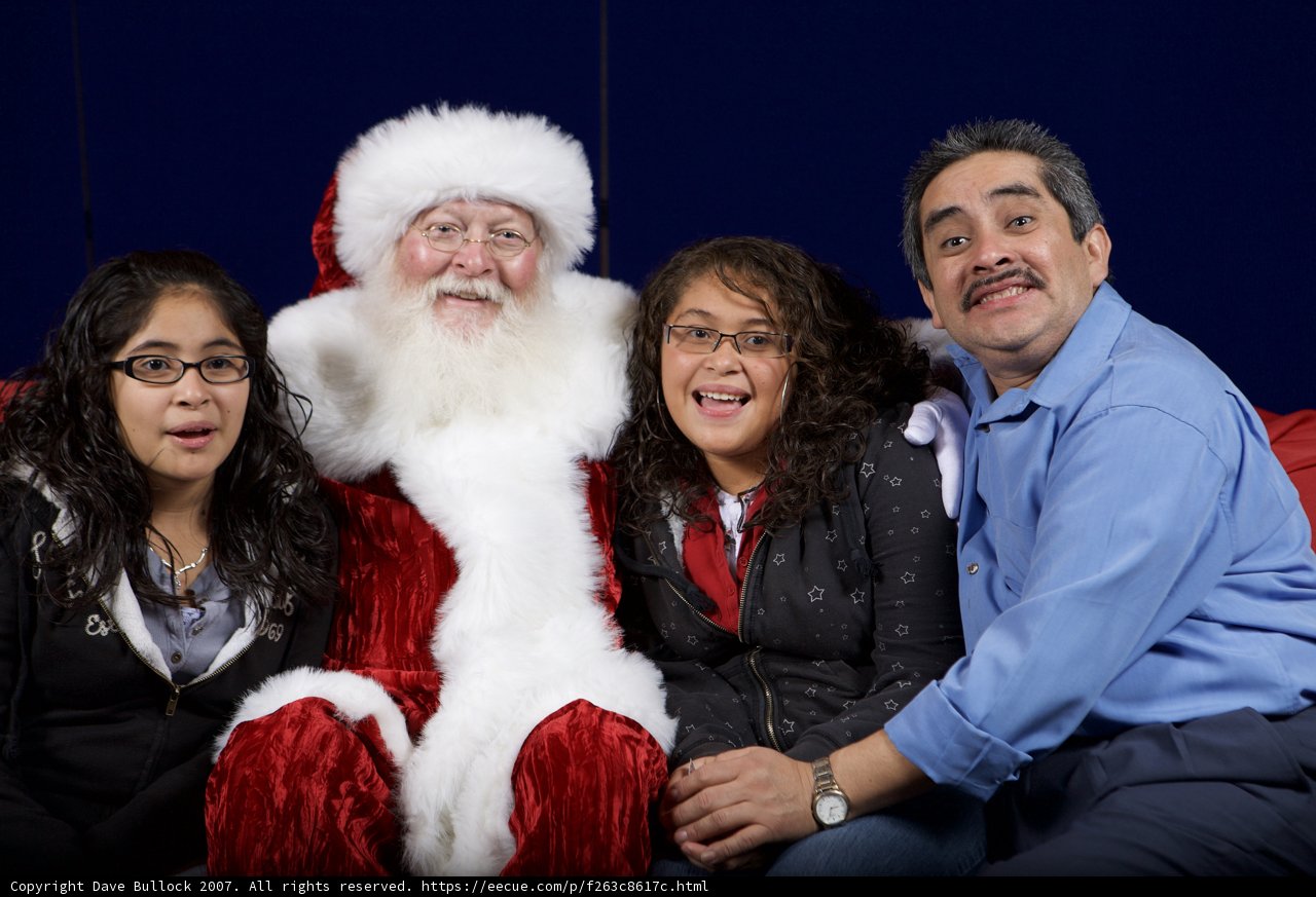 A Festive Family Photo with Santa Claus