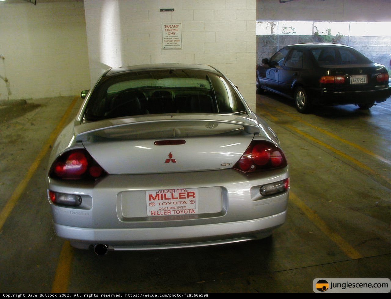 Silver Sports Car Parked Inside Garage