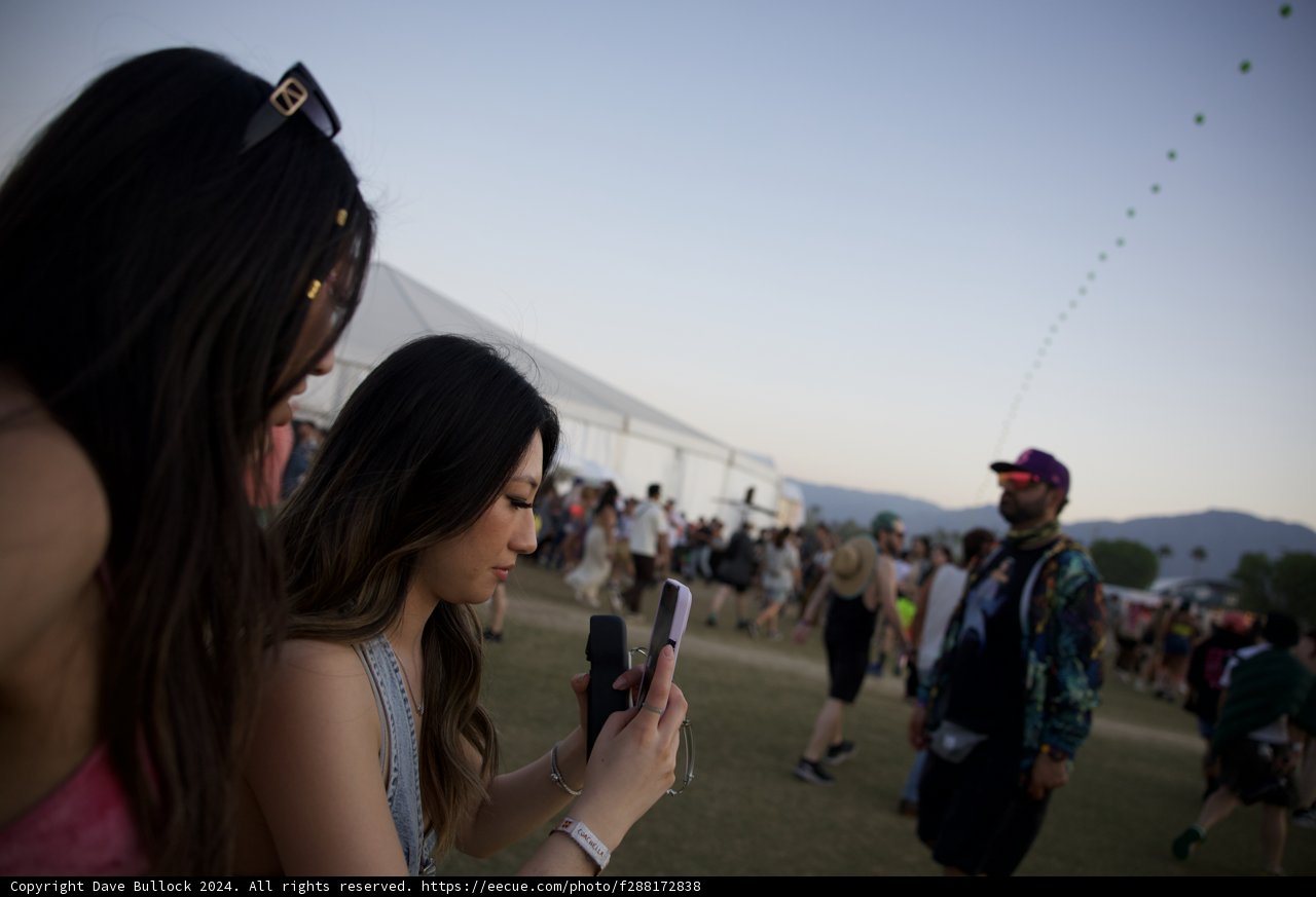 Candid Moments at Coachella 2024: Connected in the Crowd