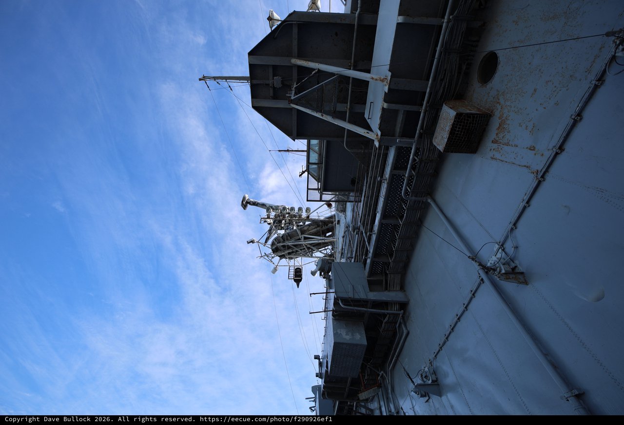USS Hornet Communications and Radar Mast Against Blue Sky
