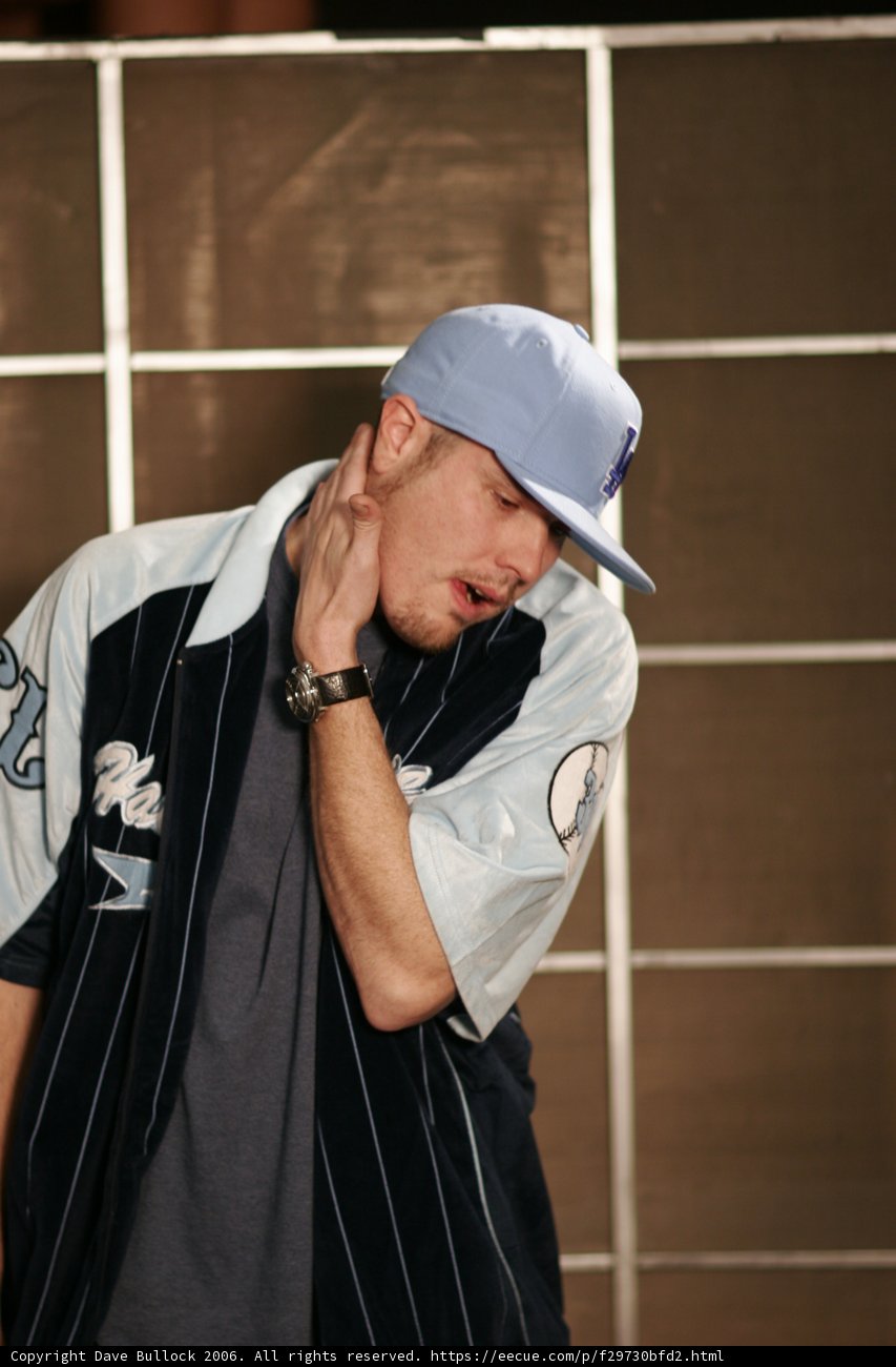 Blue Shirt, Baseball Cap, and Respect