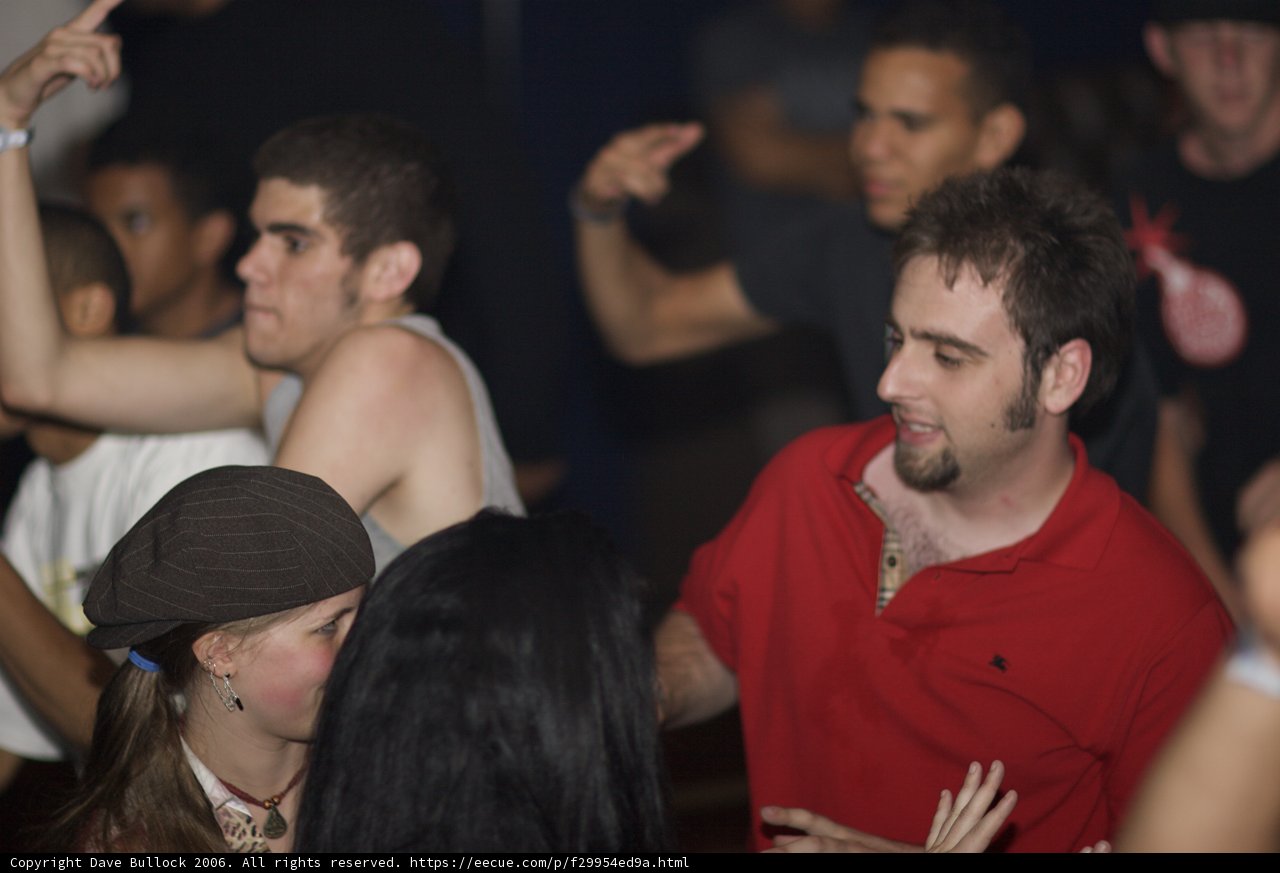 Red Shirt and Baseball Cap in the Urban Night