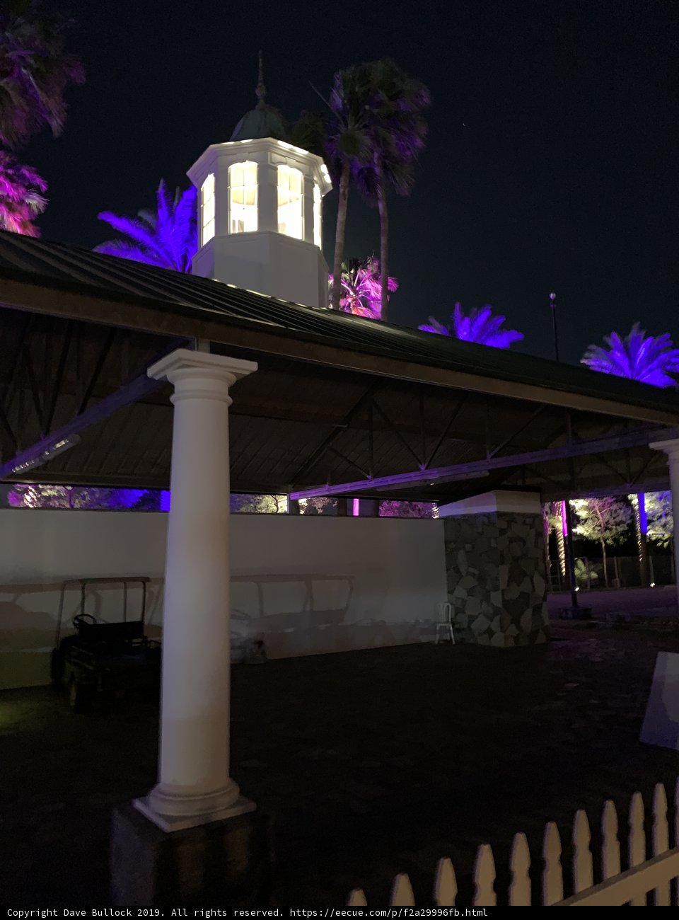 Illuminated Purple Clock Tower at the Empire Polo Club