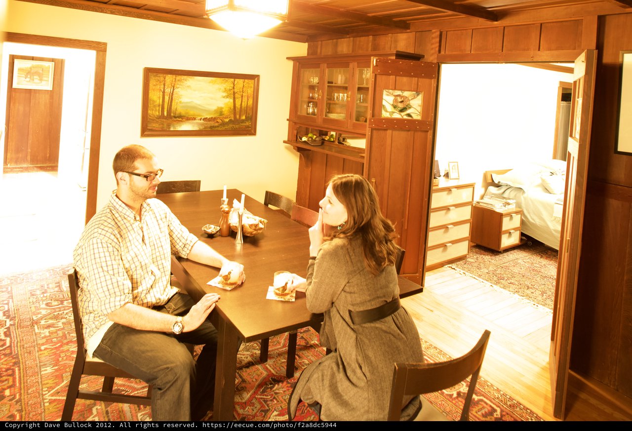 Couple Shares Intimate Conversation at Dining Table