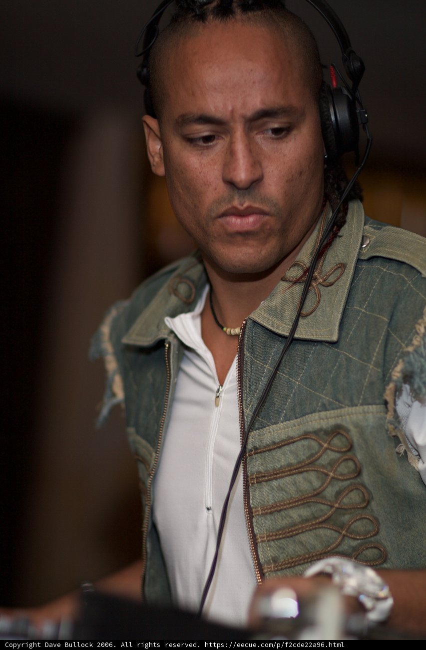 Man in Jacket Listening to Music