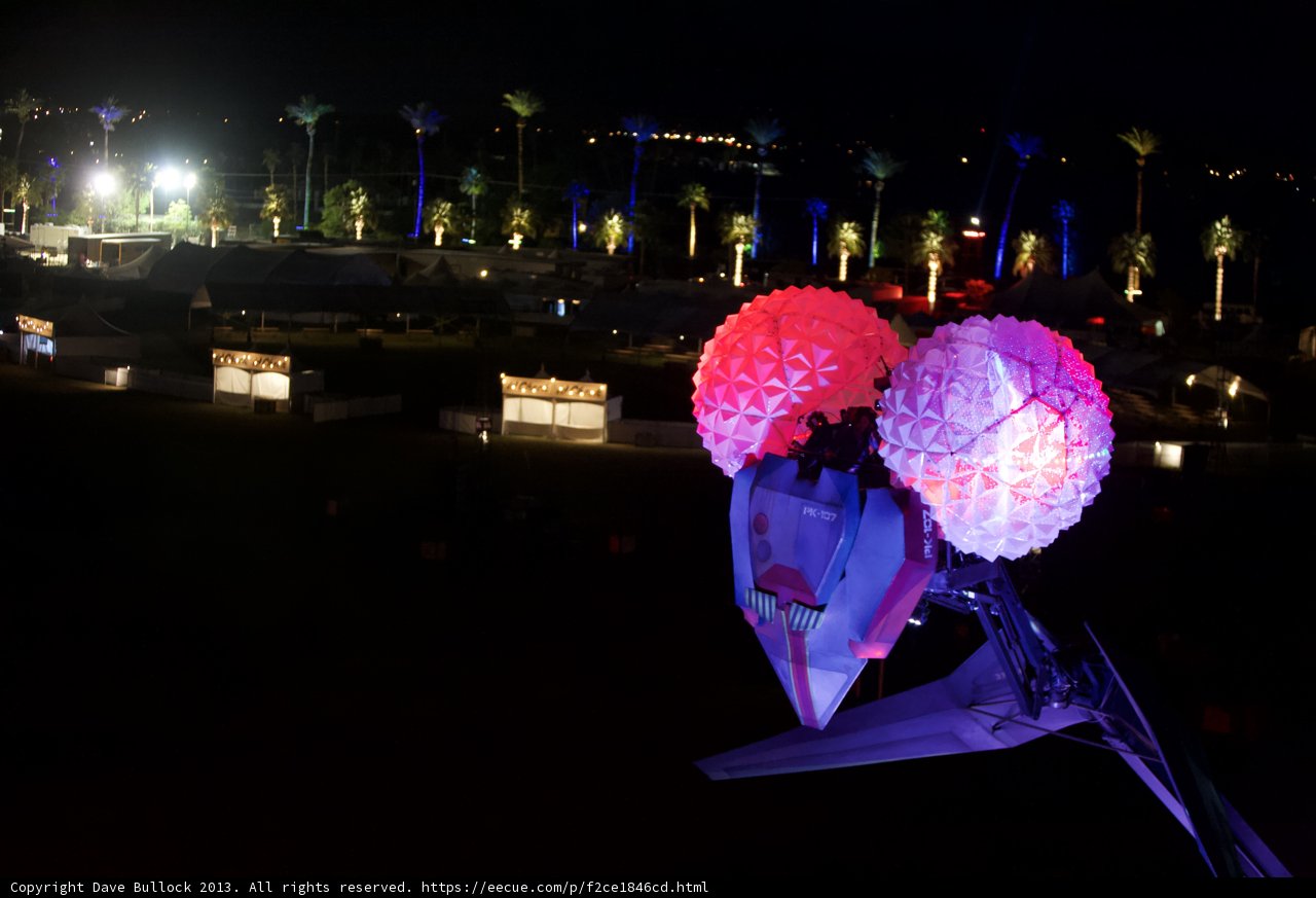 Illuminated Flower atop Building