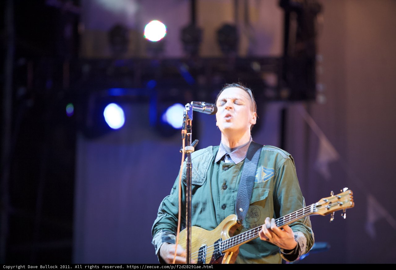 Win Butler Shines on Stage with His Guitar
