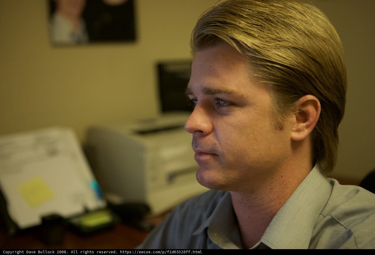 Blonde Man at the Electronics Office