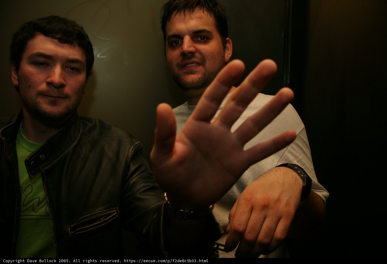 Two Men Strike a Pose