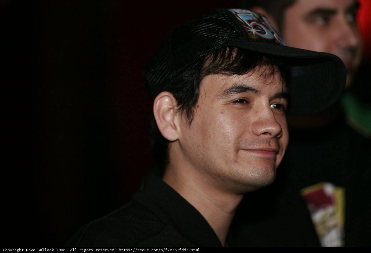 Smiling Man in Baseball Cap