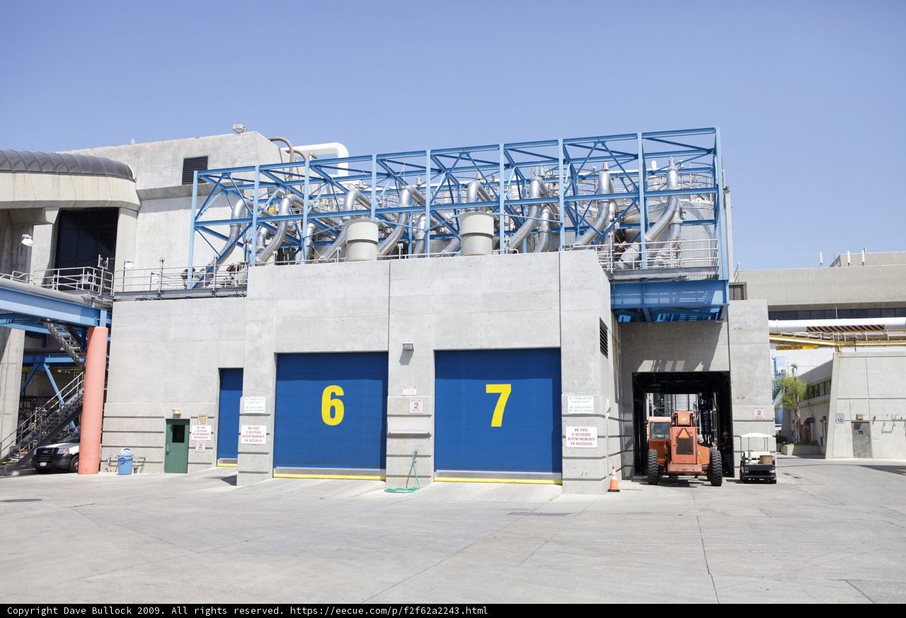 Building with Blue Doors and Yellow Number 7