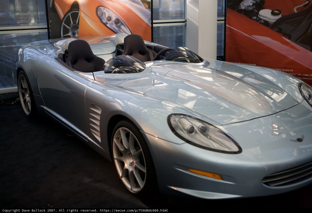 Shiny Silver Sports Car with Spoke Wheels