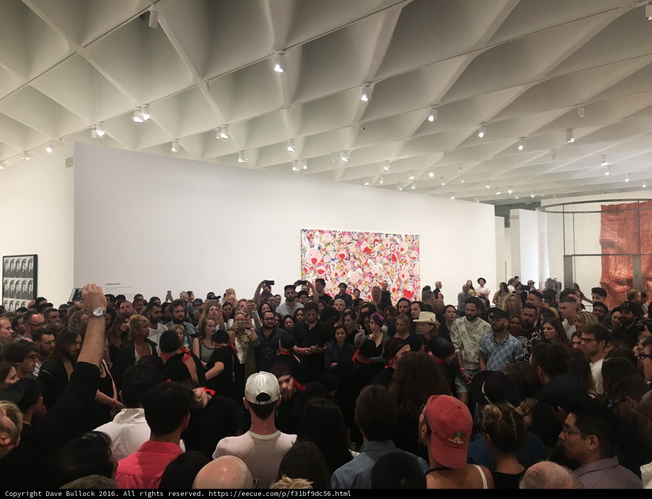 Art Gallery Crowd Admires Large Painting