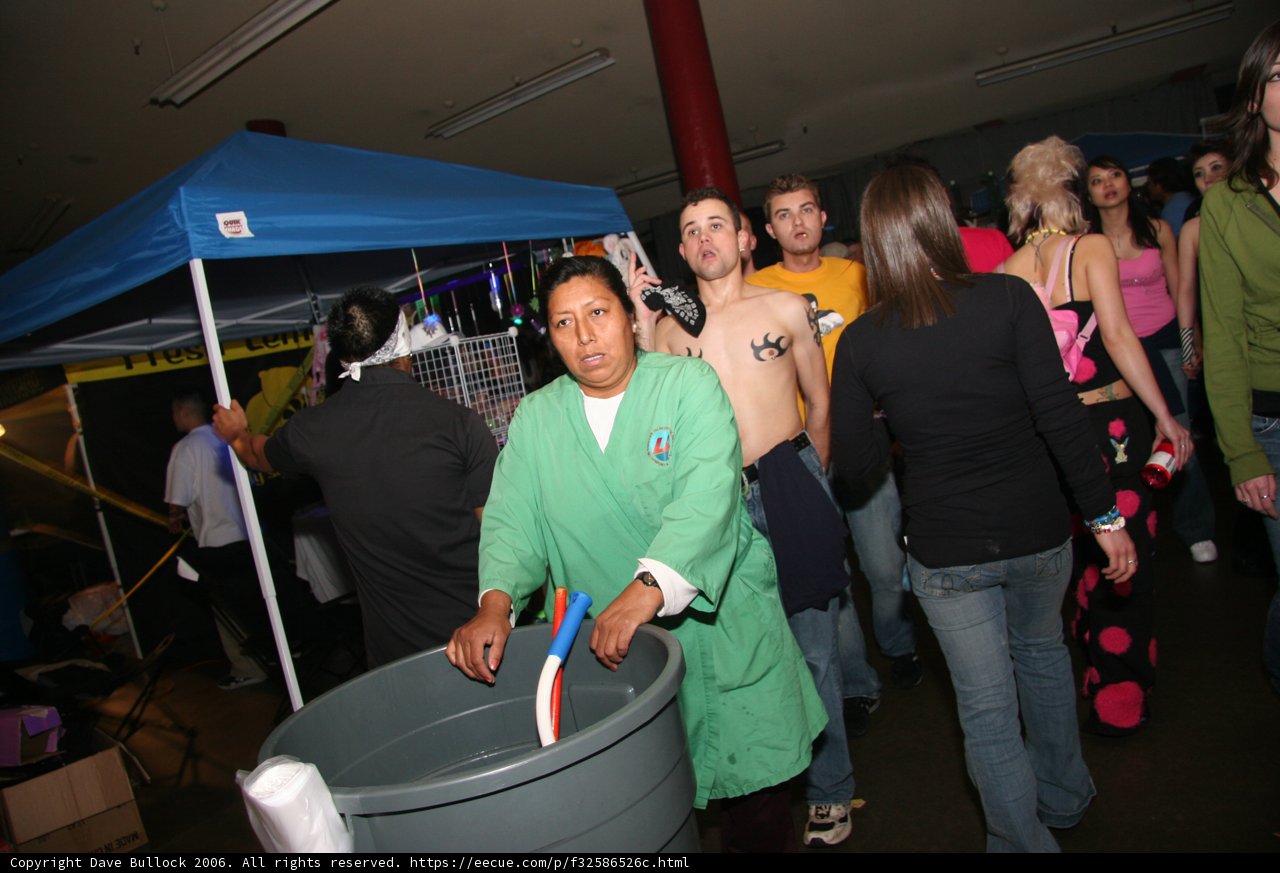 Green Shirted Woman in Casual Gathering
