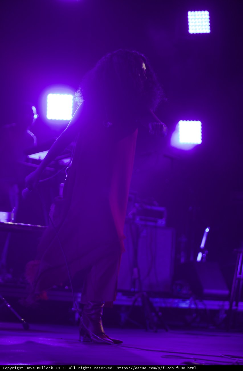 Solange Silhouette From Behind Arm Reaching Purple