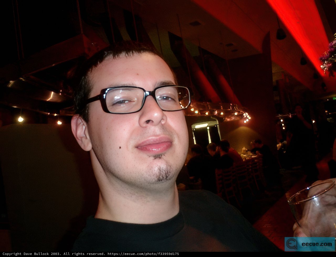 Portrait of Dave B. Enjoying a Drink at a Hip Urban Bar