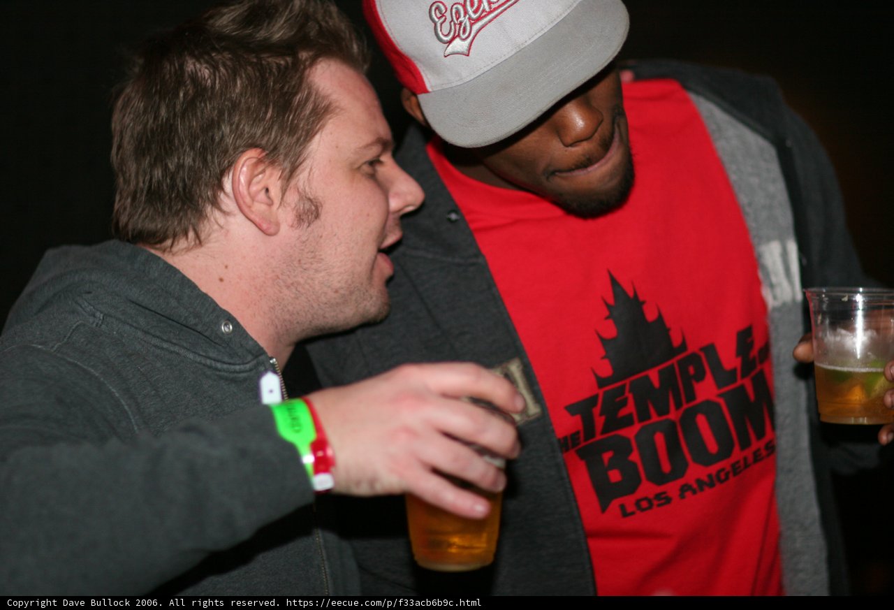 Two Men Enjoying Beer Together