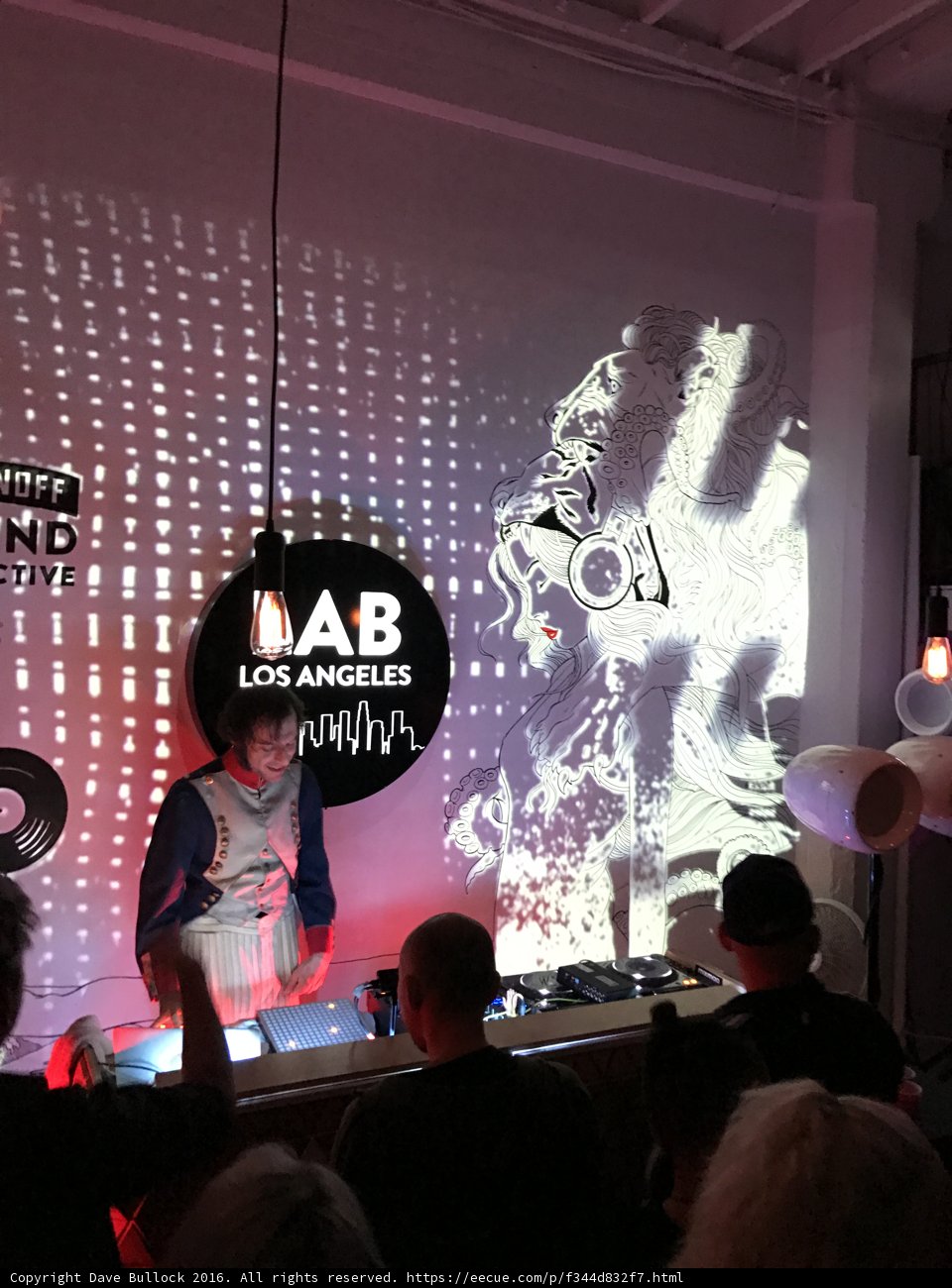 Musical Performance on Stage with Large Screen in Los Angeles