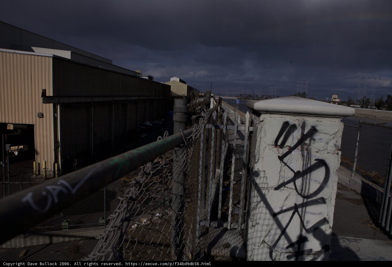 Rainbow Over Industrial Landscape