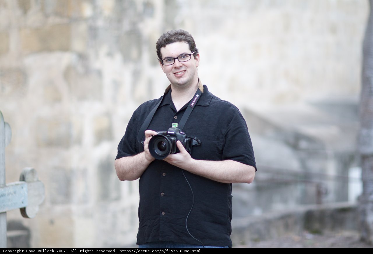 Photographer Dave B with Camera and Glasses