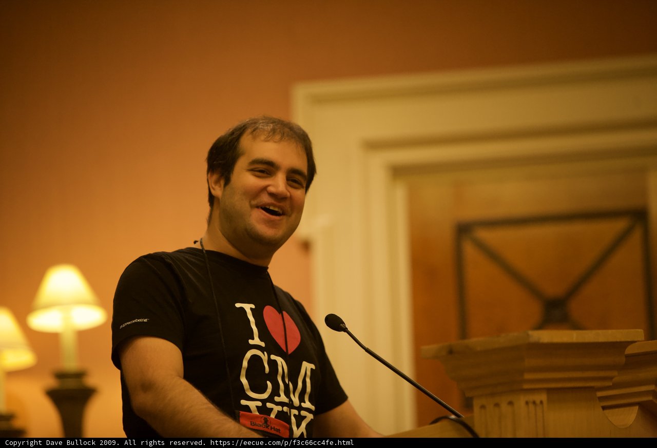 Dan Kaminsky Giving a Speech in a Black T-Shirt