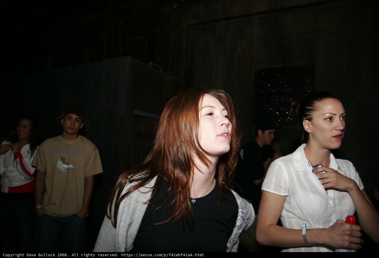 Red-headed woman at the urban night club