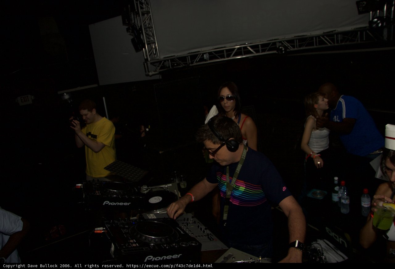 Party People Getting Funky with the DJ Equipment