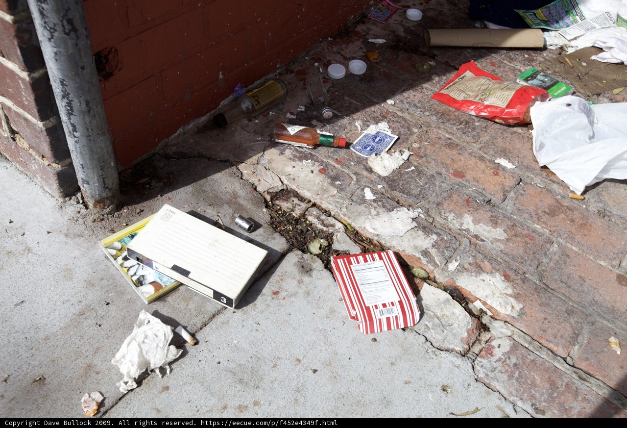 Garbage Dumped on City Walkway