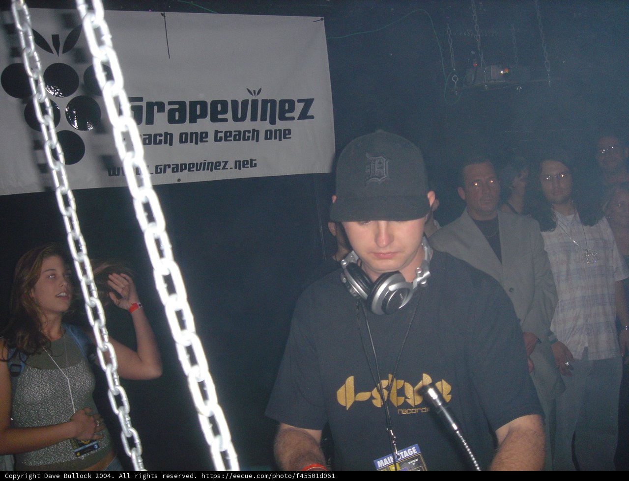 Black-shirted Deejay in a Night Club