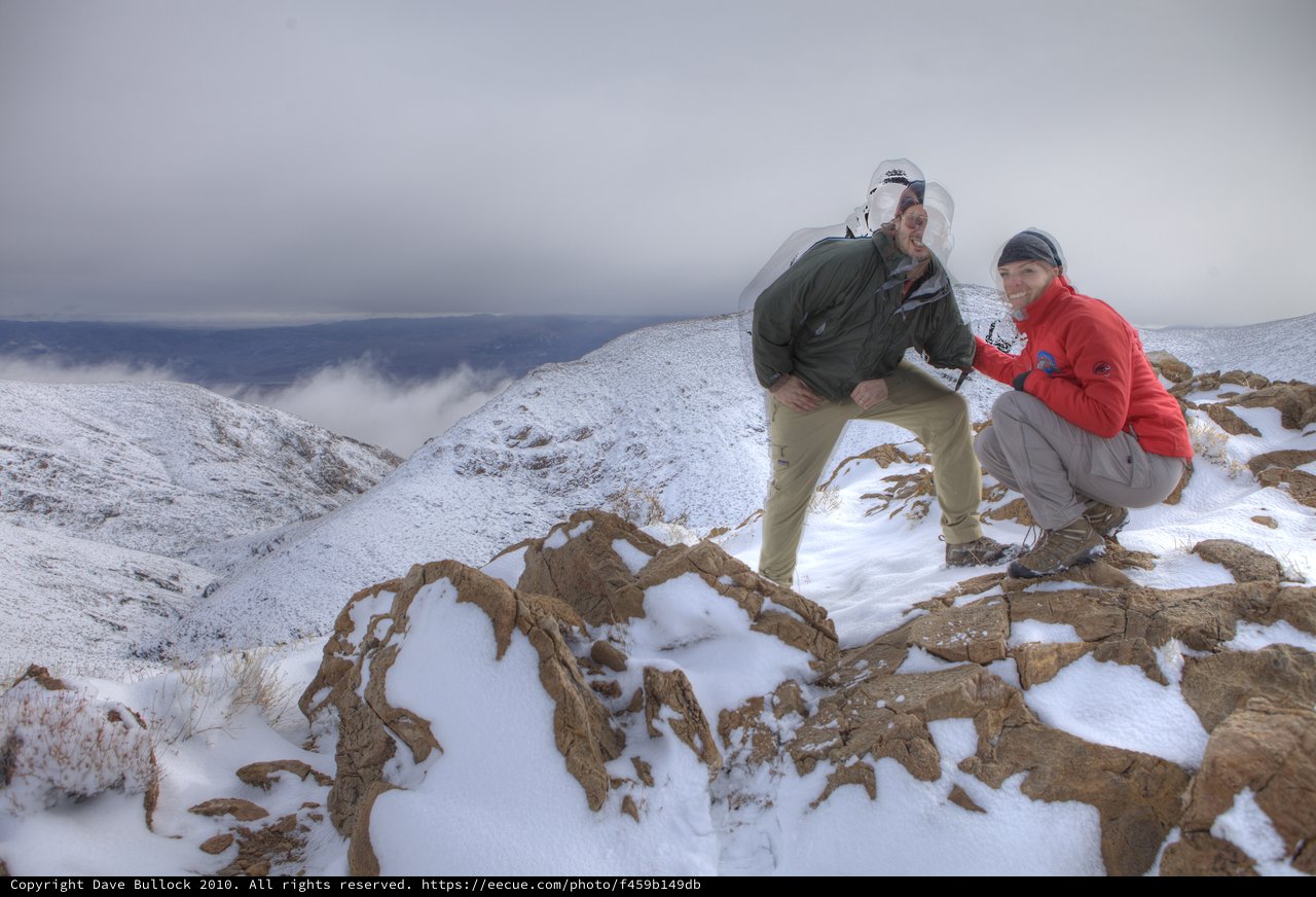 Winter Summit Victory on Snow-Capped Mountain Peak
