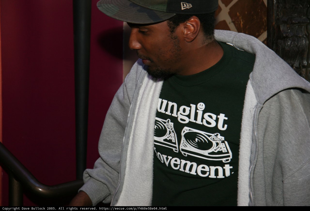 Grey Hoodie with T-Shirt and Baseball Cap