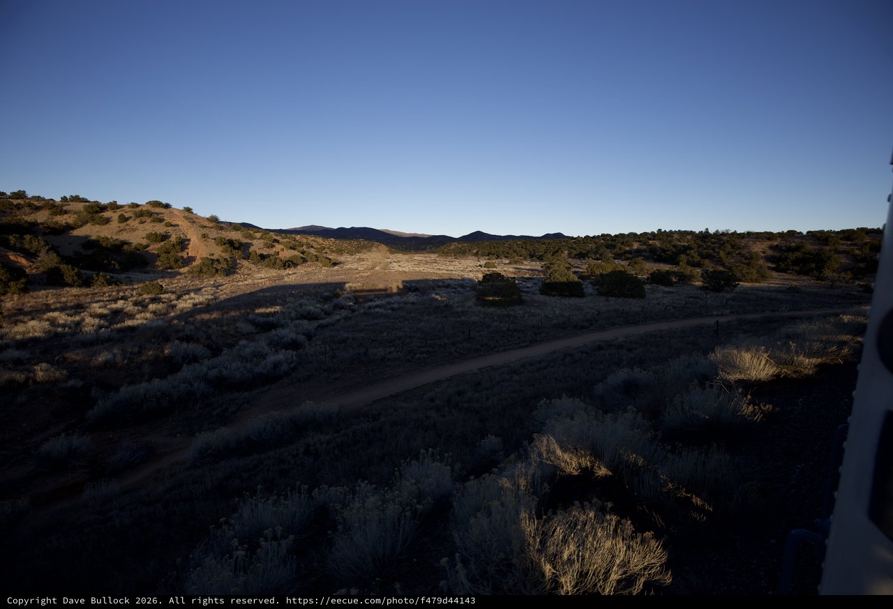 Desert Dirt Road at Dusk in Arid Southwest Landscape
