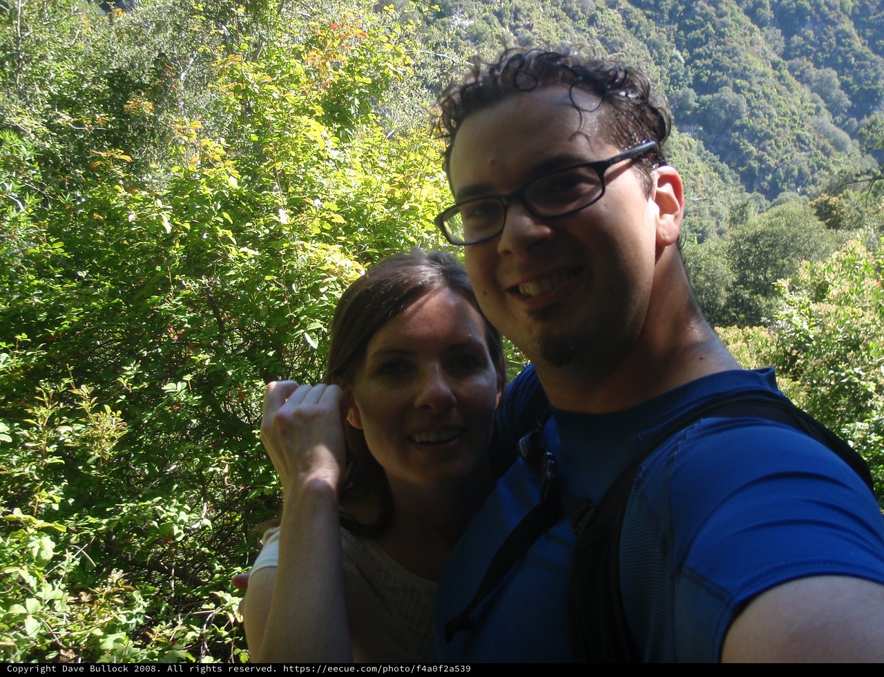 Couple's Selfie Amid Lush Forest Greenery