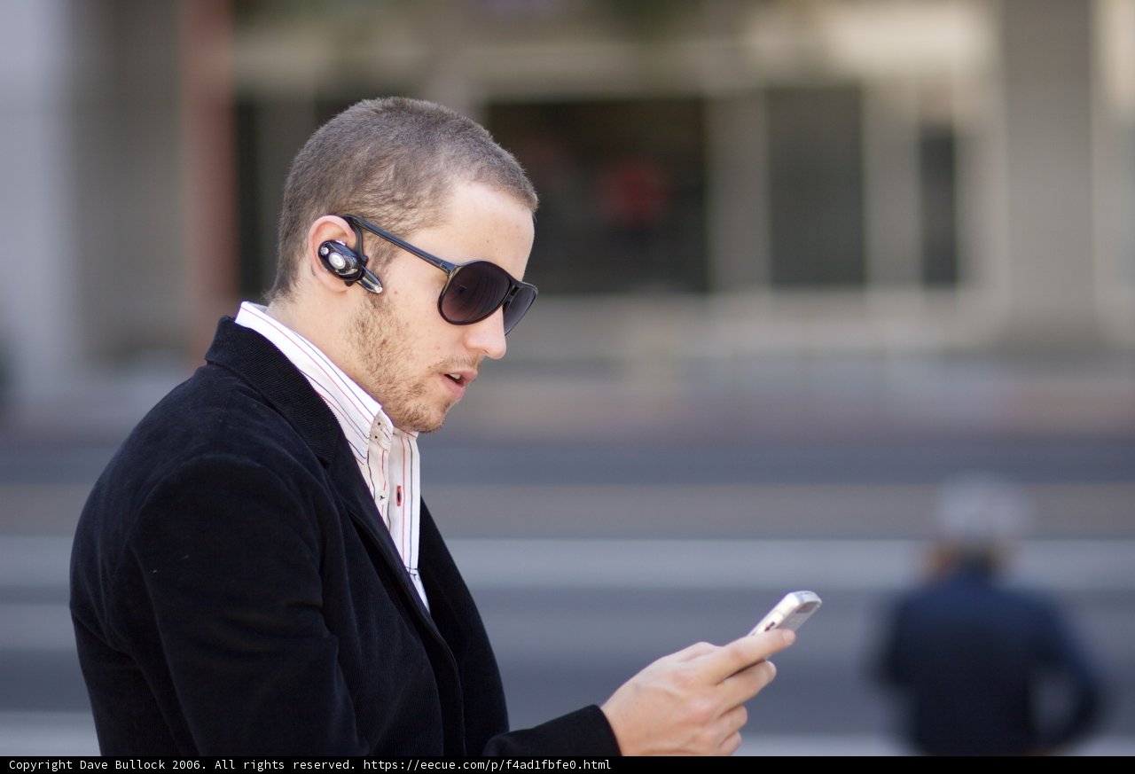 Stylish Men with Their Tech