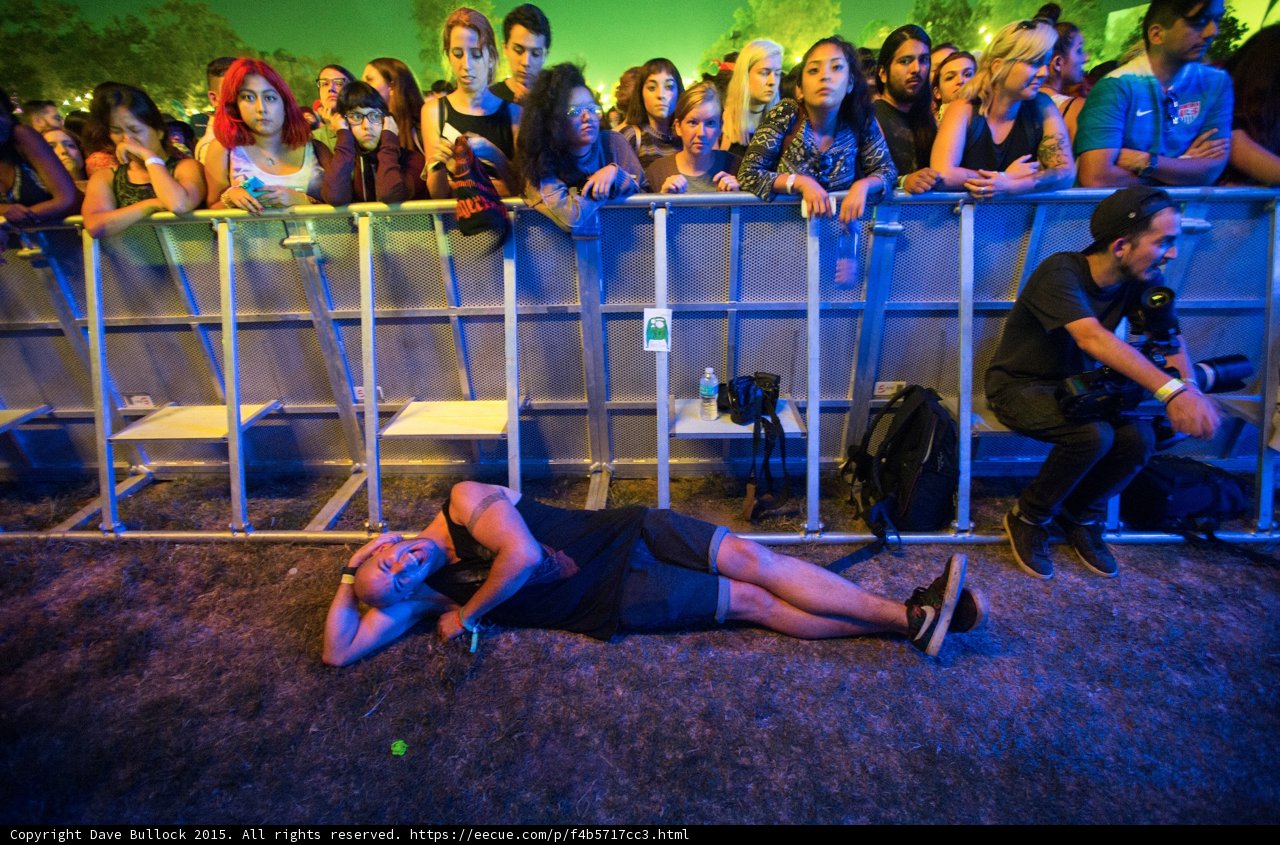 FYF Fest Front Row Fans Barricade Exhausted Man Ground Photographer Diverse Crowd