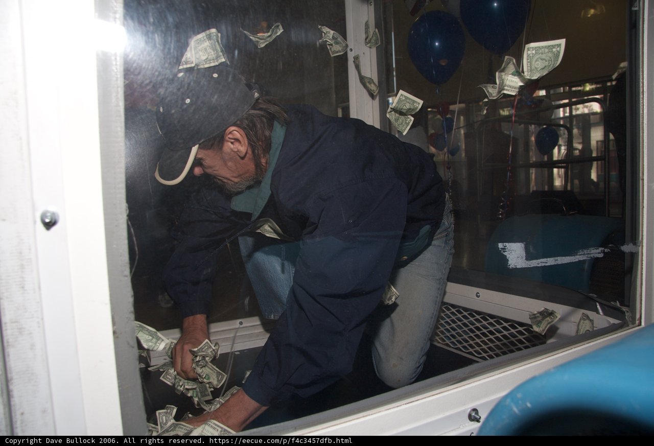 Man contributing money to a cause