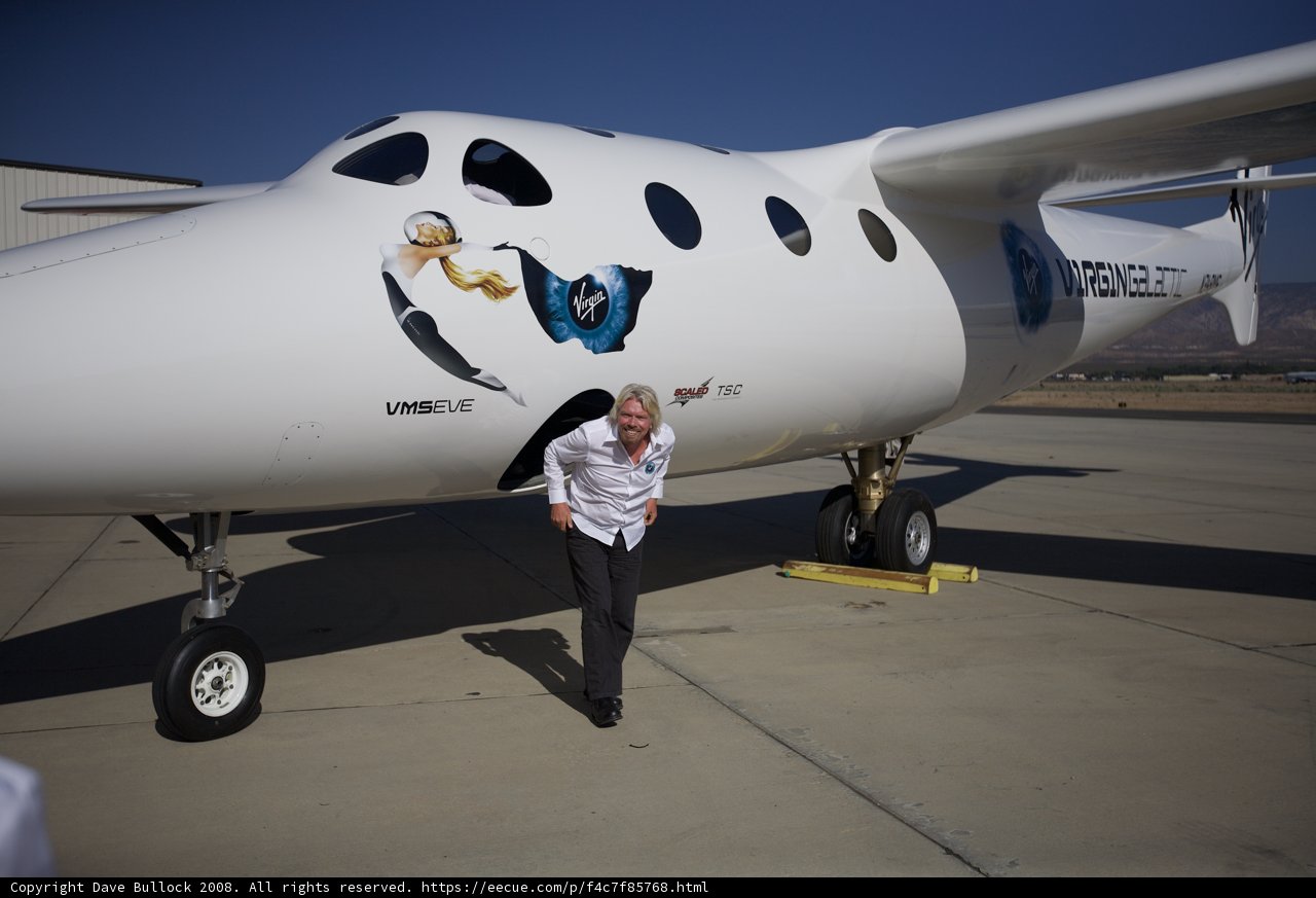 Richard Branson next to his White Knight Two