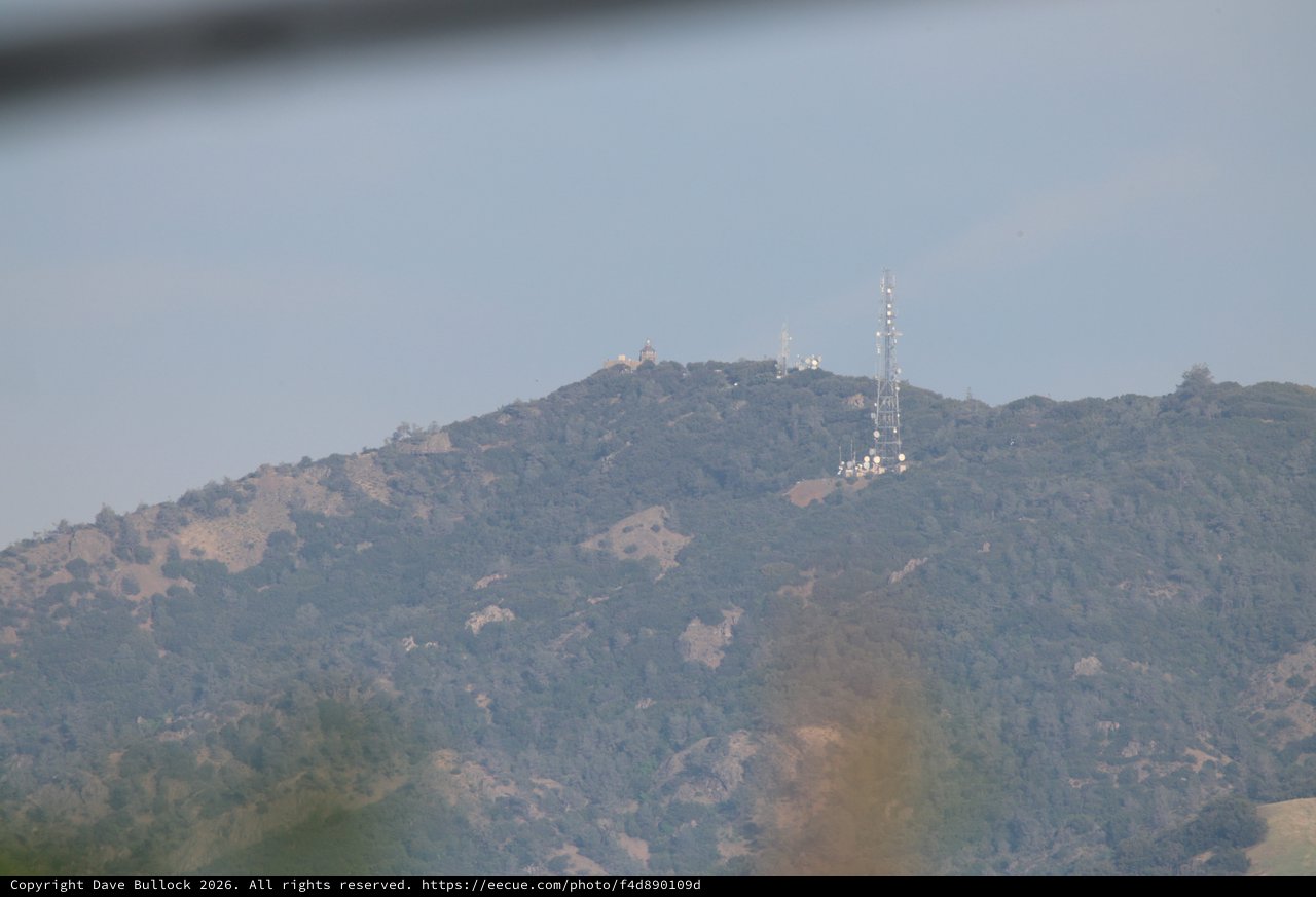 Communication Tower on Hazy Mountain Ridge