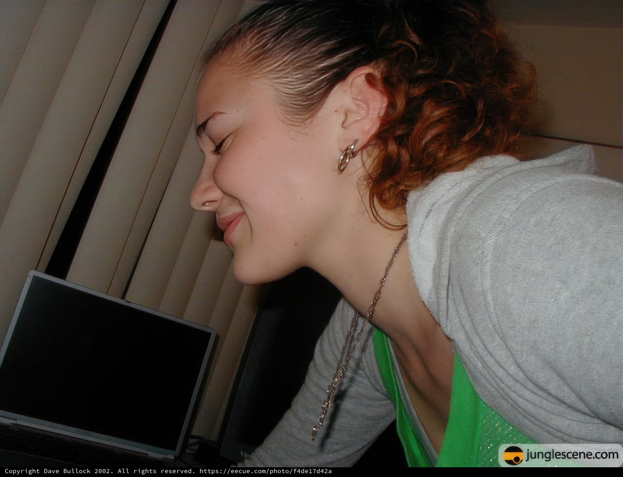 Curly-Haired Bree with Laptop and Jewelry