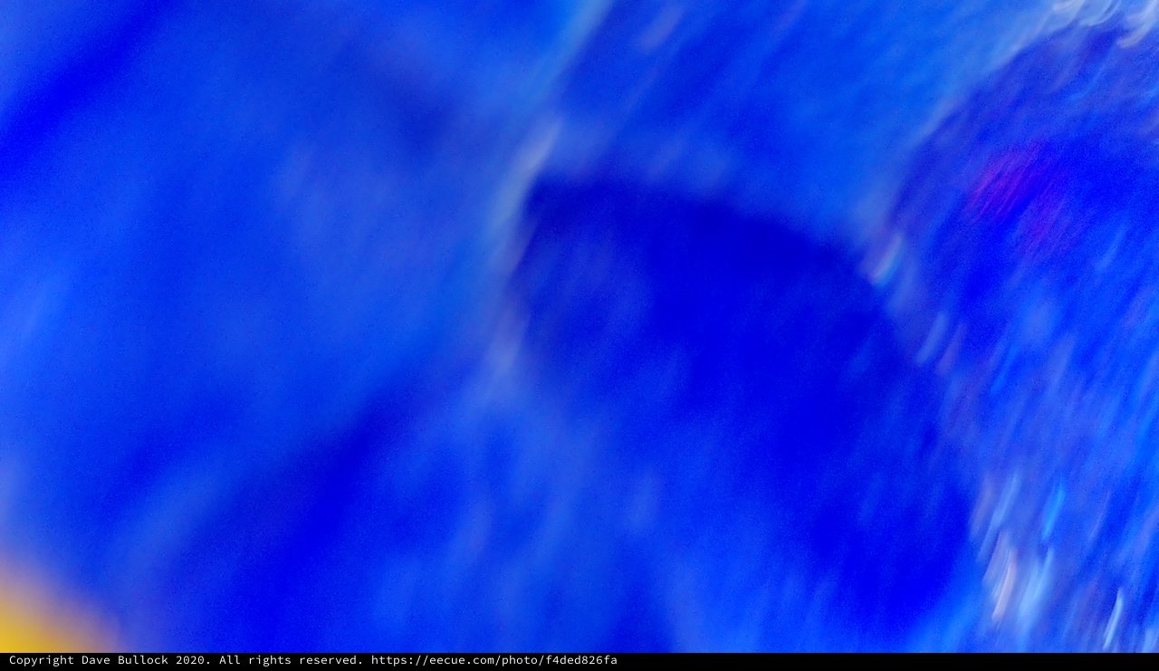 Electric Blue Vortex: Abstract Microscopic Swirling Patterns