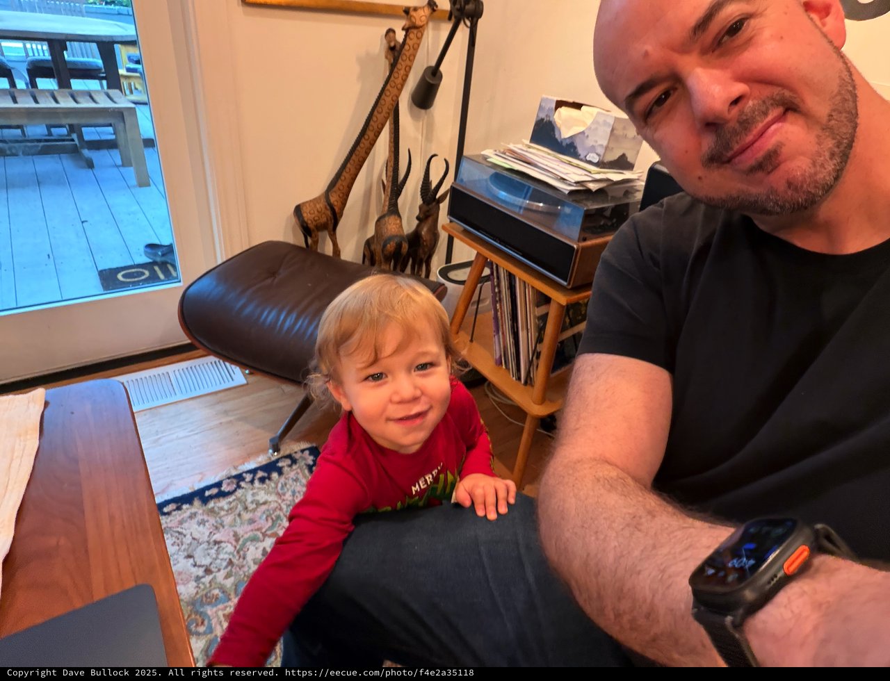 Father and Child Gaming Together at Home