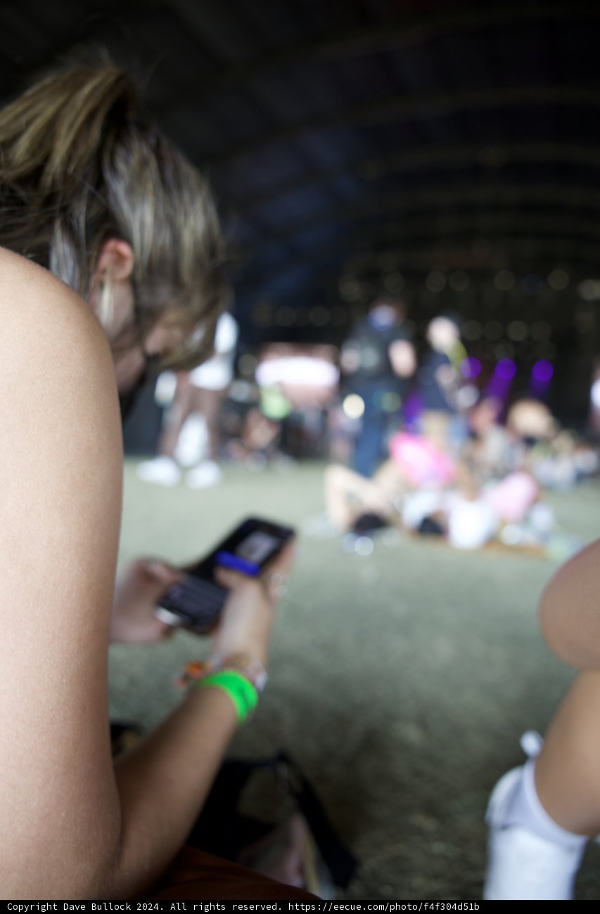 Connected in the Crowd: A Moment of Mobile Mingling at Coachella 2024