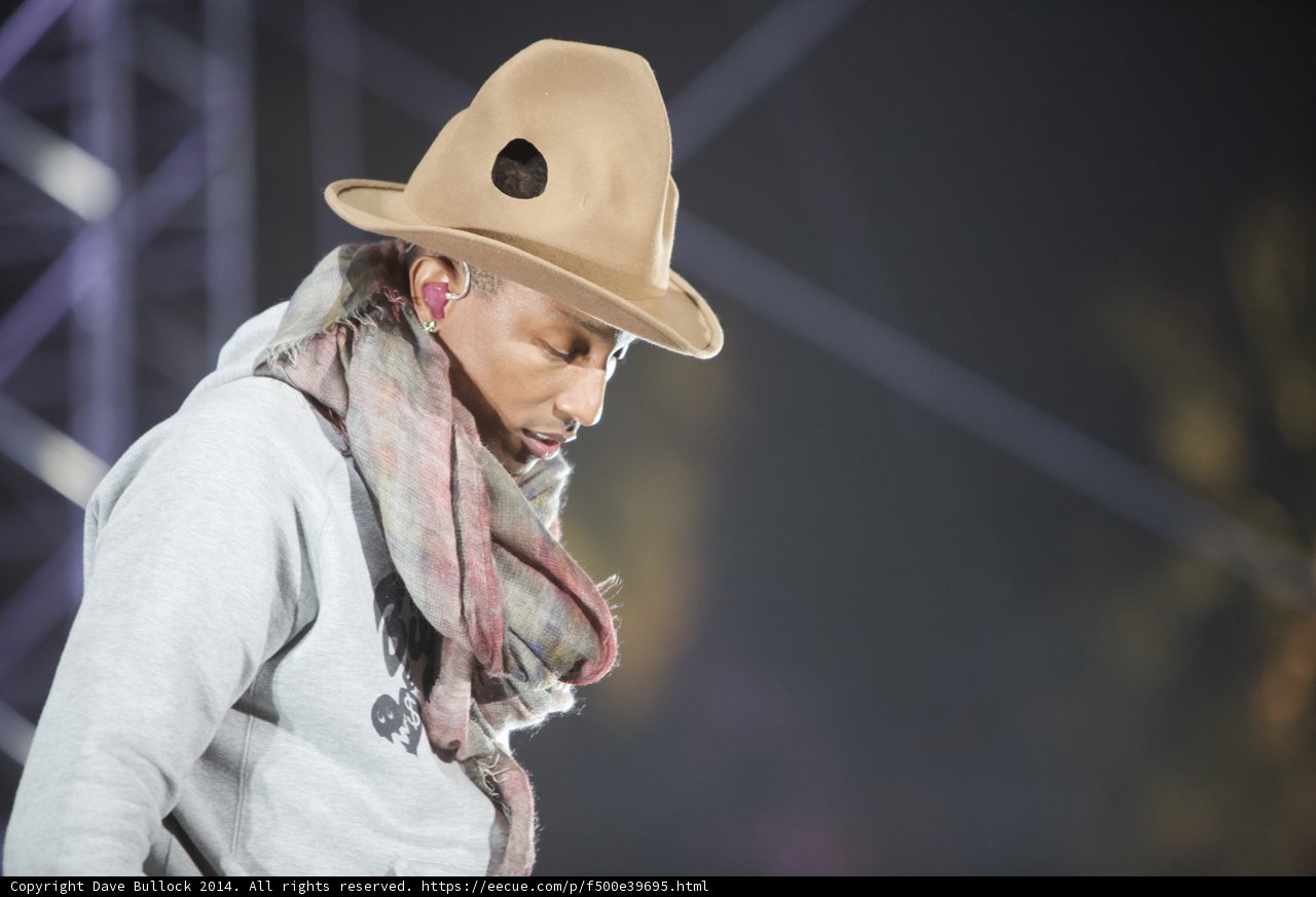 Pharrell Williams Performs in a Stylish Sun Hat and Scarf