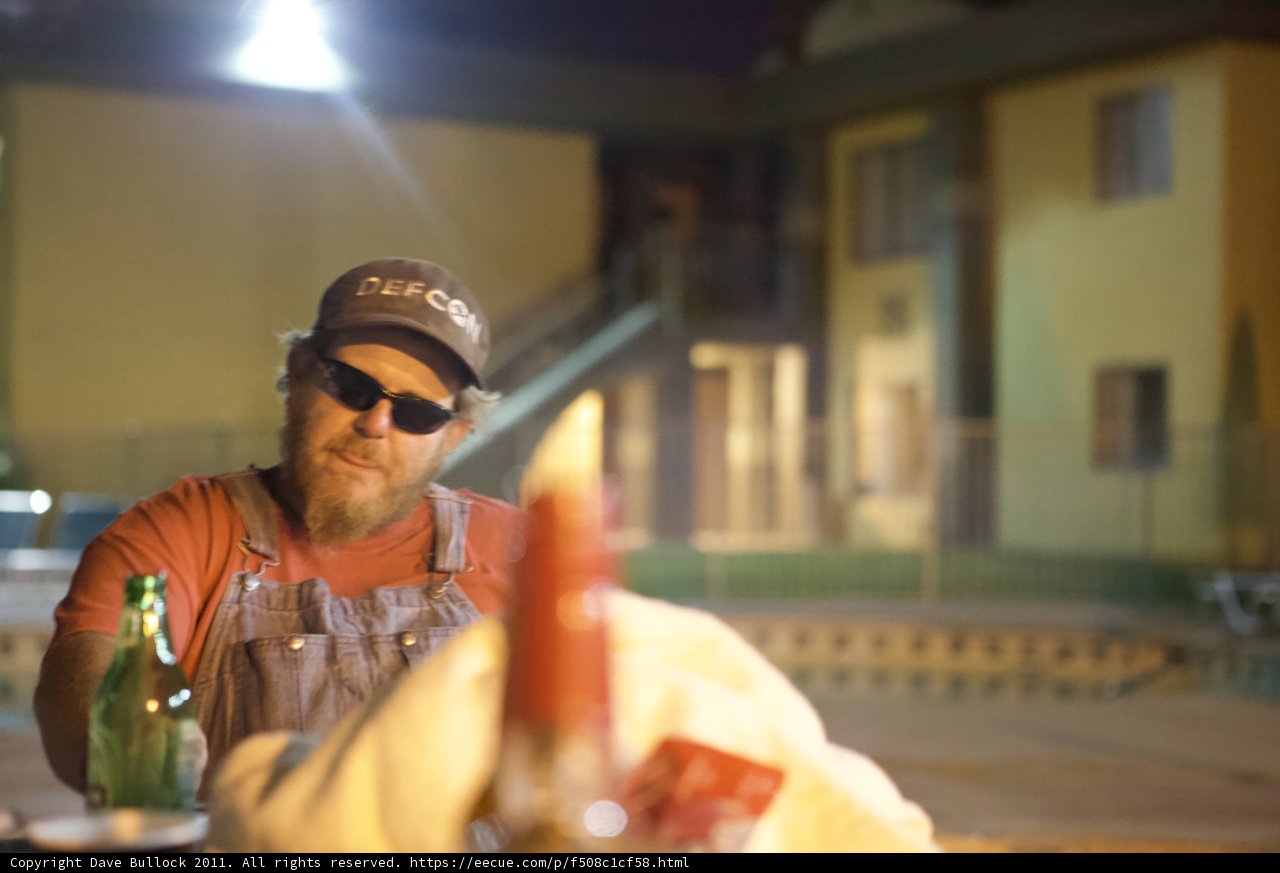 Bearded man enjoying a cold brew