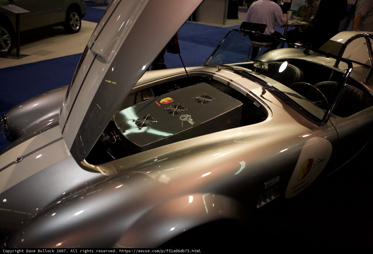 Silver Sportscar with Open Hood