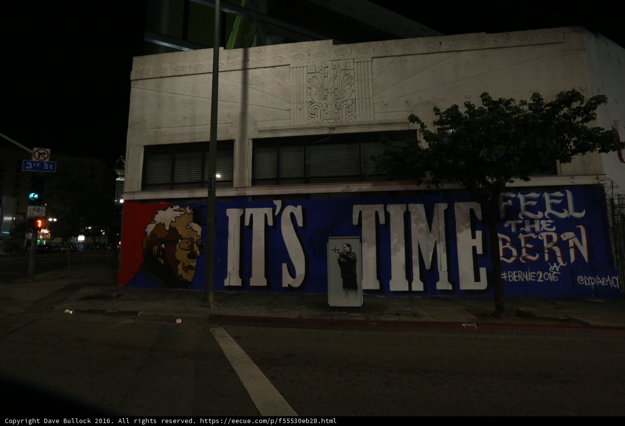 Nighttime Mural of Bearded Man on City Building
